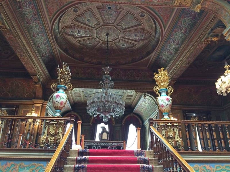 Large chandelier, red staircase and interior decorations of a Dolmabahce palace