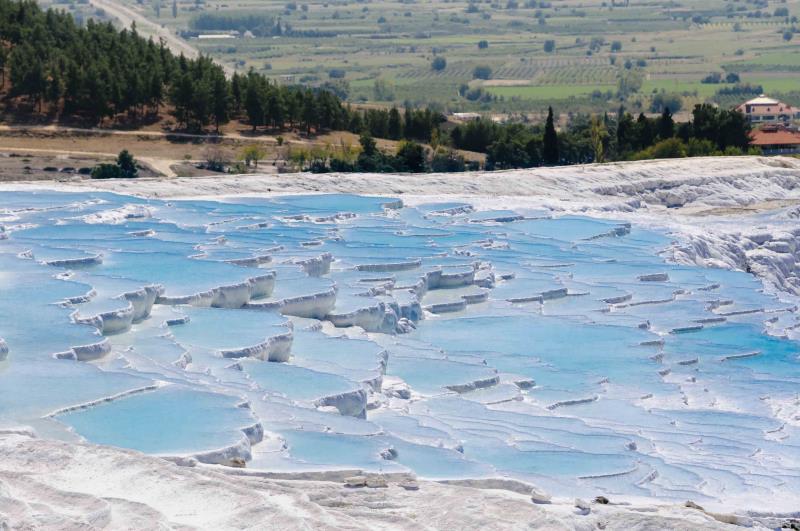 Image of Pamukkale’s blue travertines and landscape